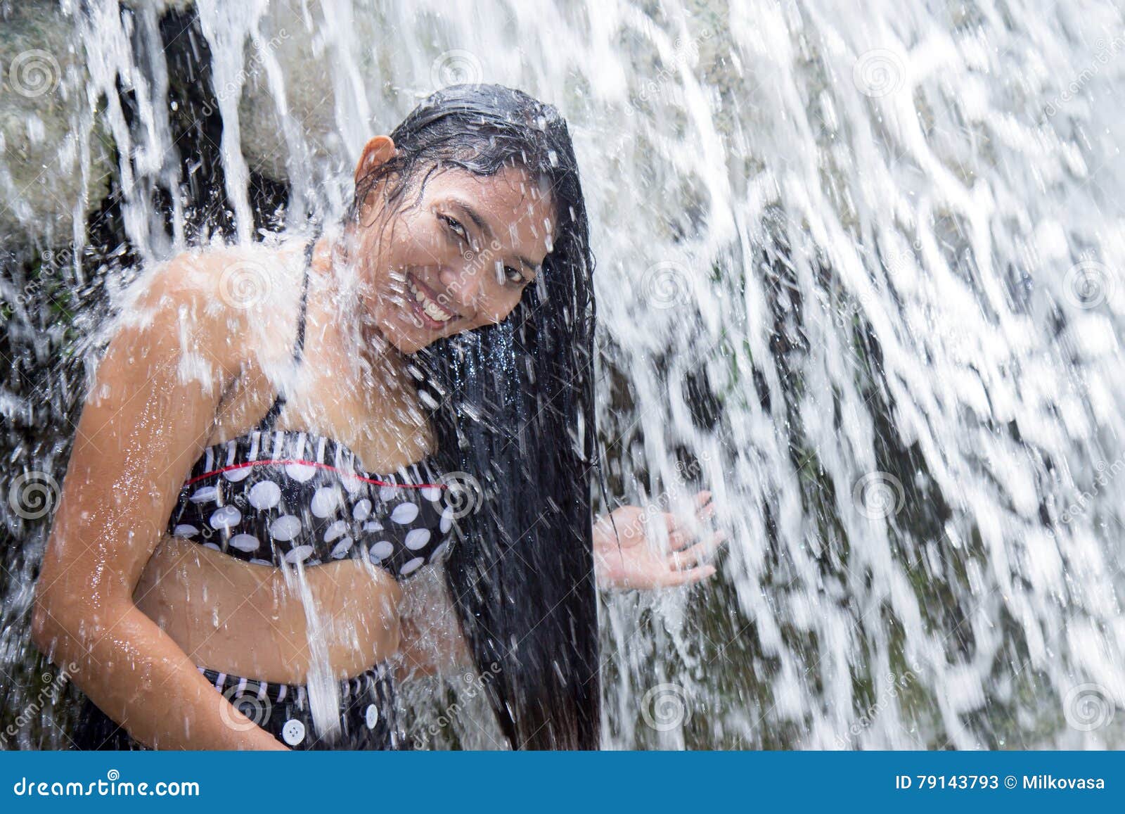 bubba hilton add women bathing in waterfalls photo