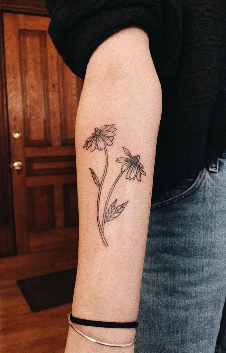 tiny black eyed susan tattoo