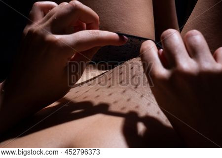 woman touching herself
