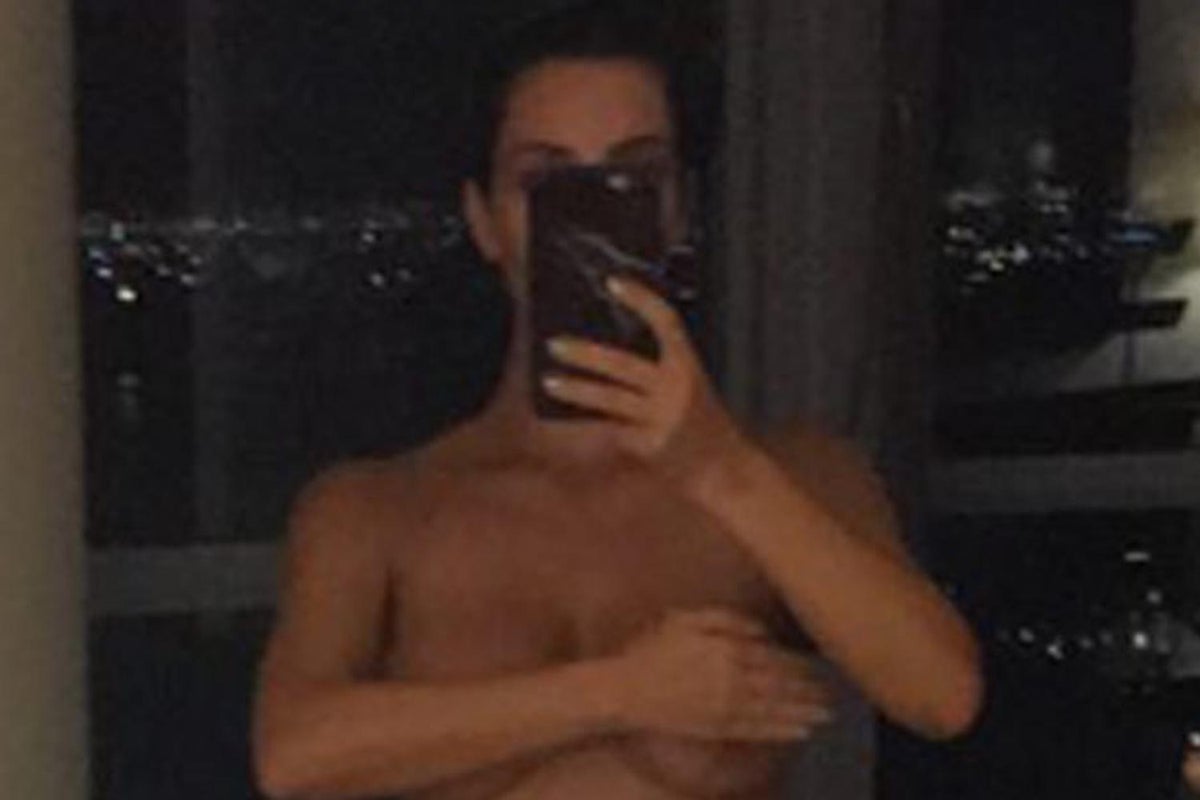 Kim Kardashian Posts Nude Bathroom Selfie erotic spell