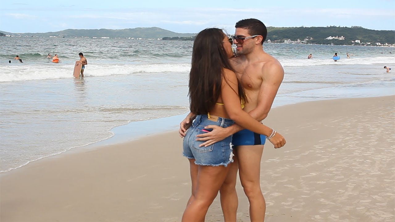 Kissing On The Beach riding motorcycle