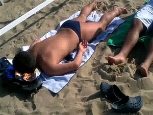 andrew camm add guy on beach in speedo fucks girl on beach porn photo