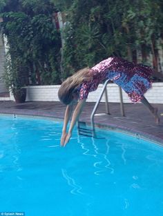 women swimming fully clothed