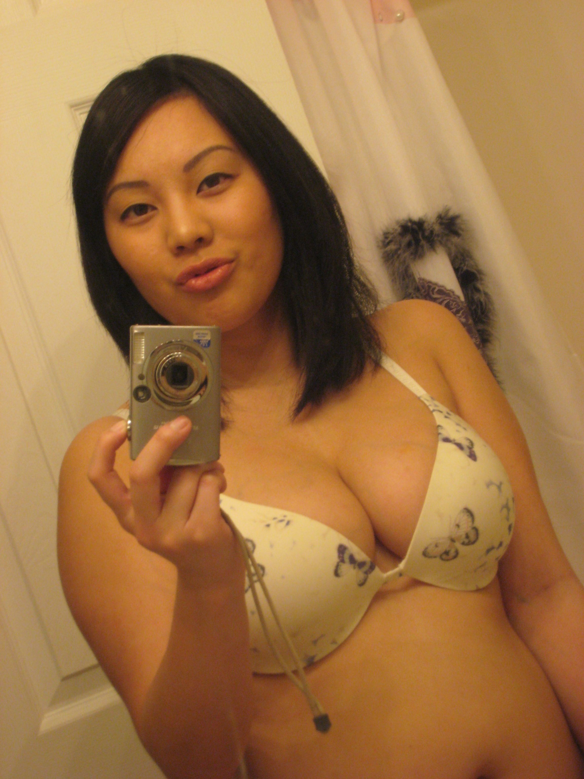 devy aprianty add busty asian topless selfie photo