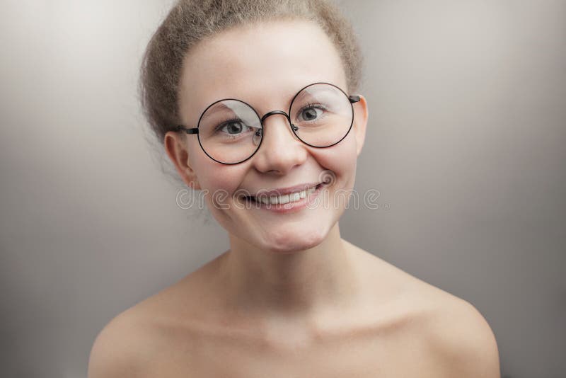 nude women wearing glasses