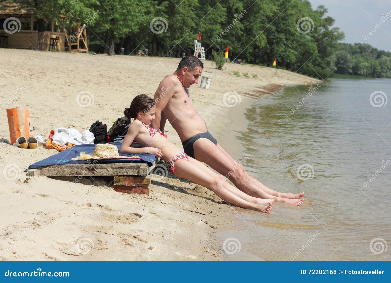 mom and daughter nude beach