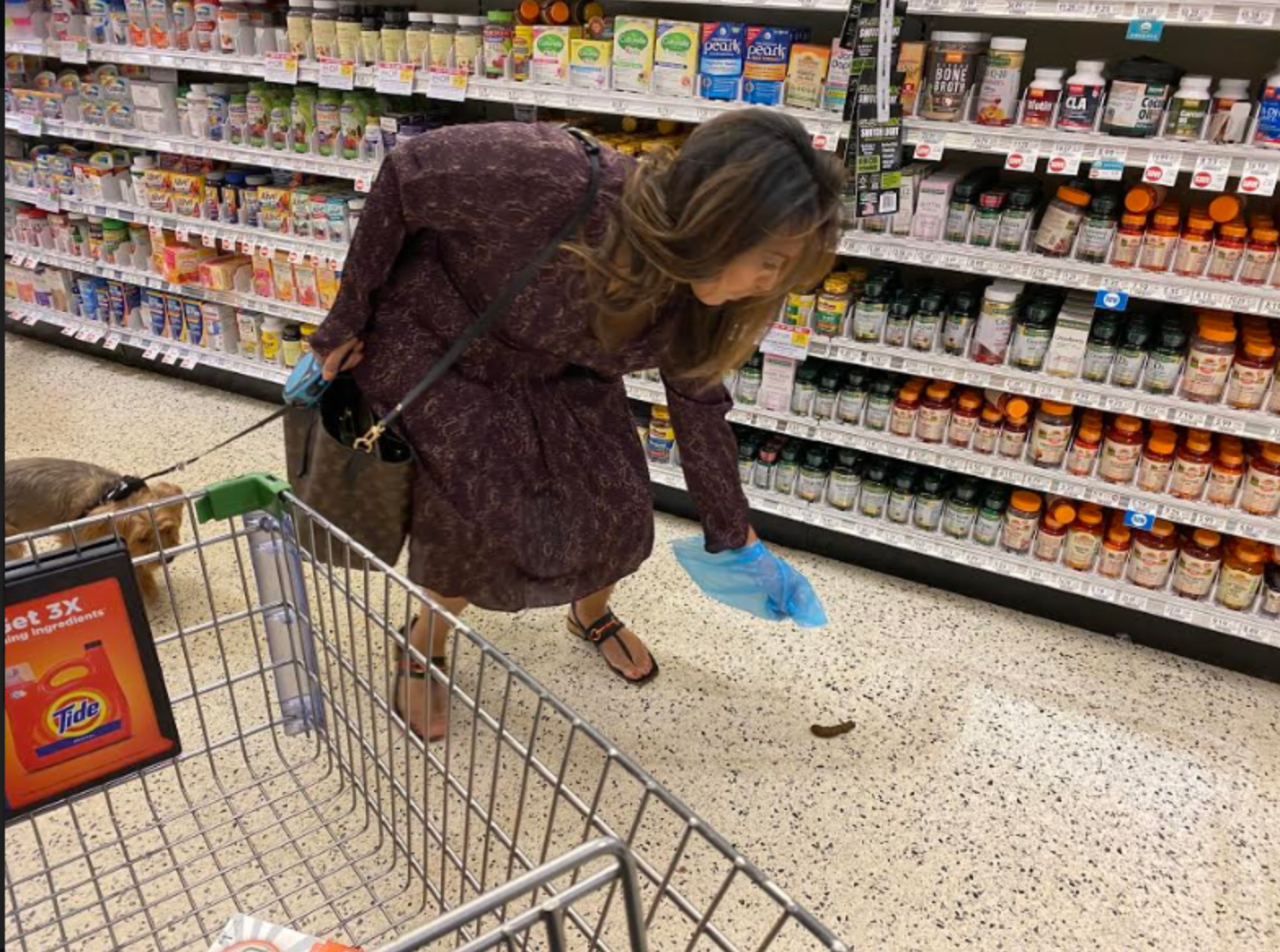 woman poops in supermarket