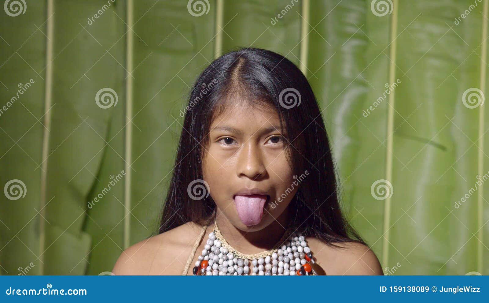 girls sticking tongue out