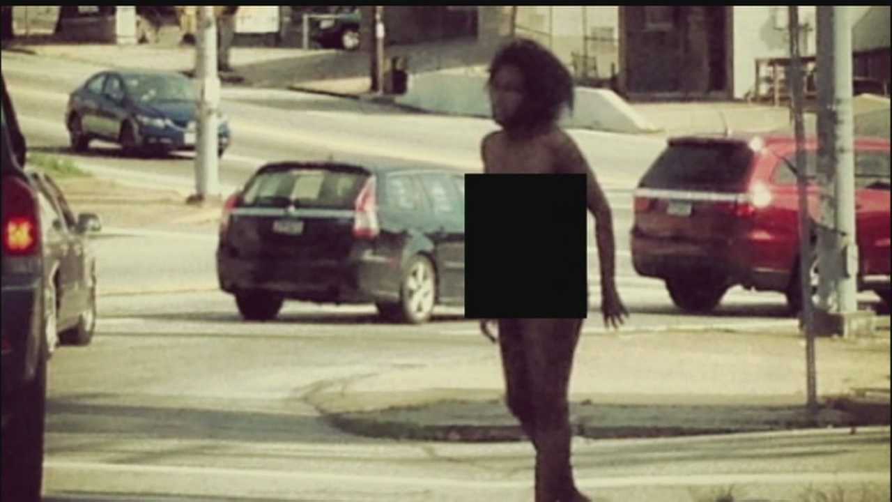 woman naked in street