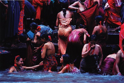 women bathing in waterfalls