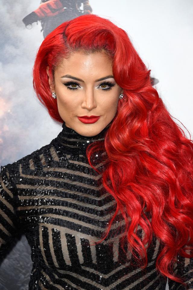 allan baird recommends wwe red hair diva pic